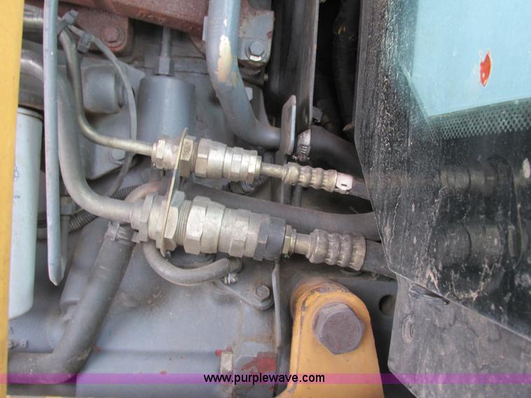 image for item G8870 2000 New Holland TS100 tractor