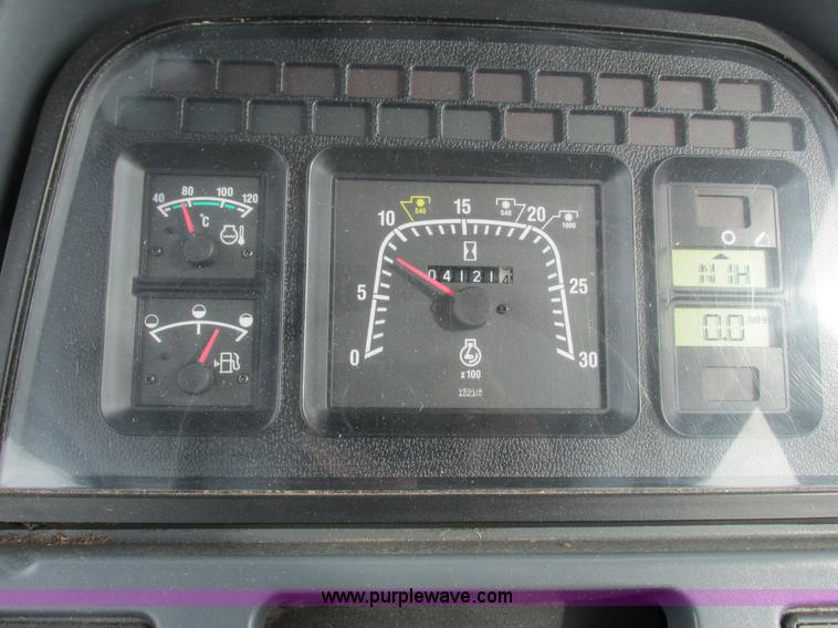 image for item G8870 2000 New Holland TS100 tractor