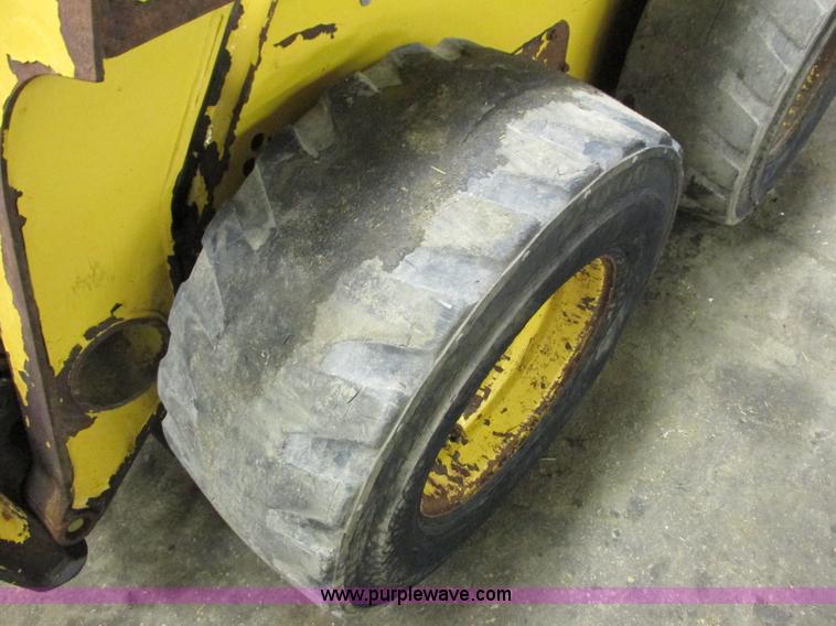 image for item G8876 2001 John Deere 250 skid steer