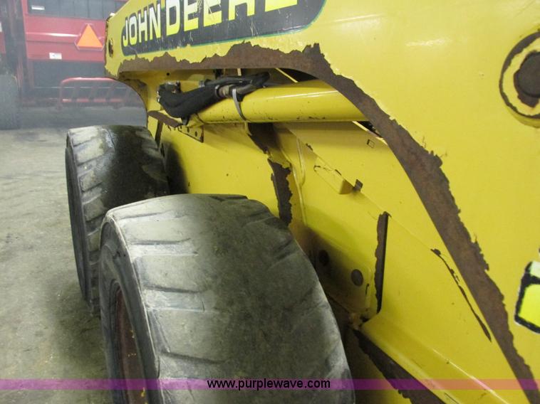 image for item G8876 2001 John Deere 250 skid steer