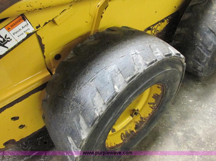 image for item G8876 2001 John Deere 250 skid steer