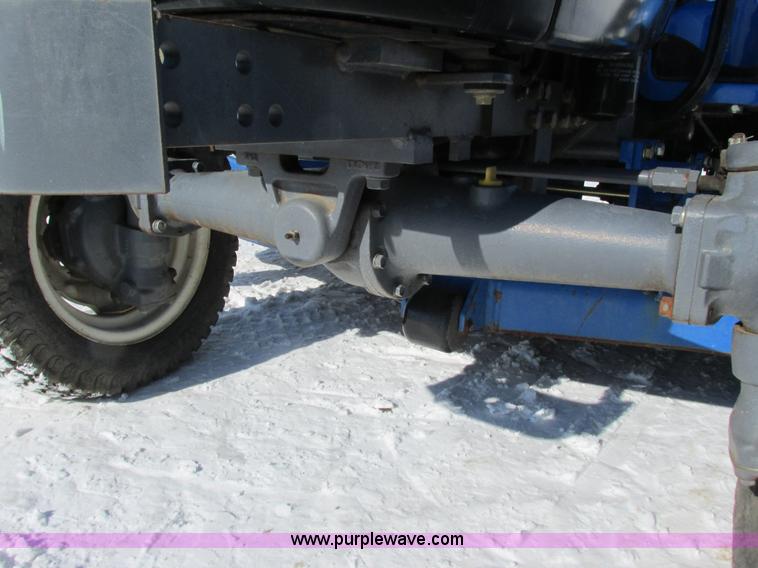 image for item G8879 2001 New Holland TC25D MFWD garden tractor