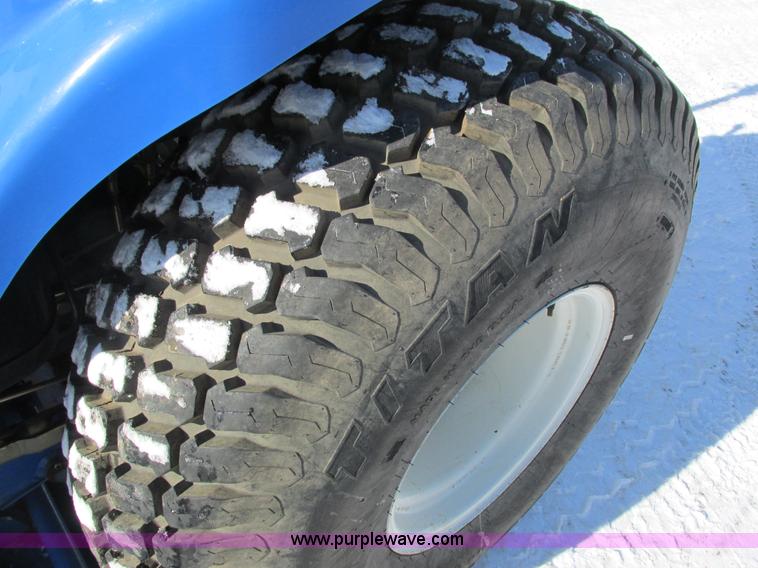 image for item G8879 2001 New Holland TC25D MFWD garden tractor