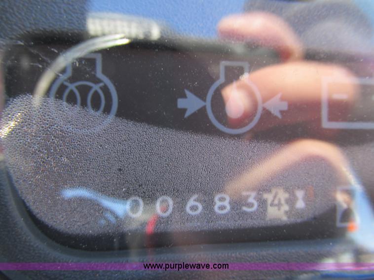 image for item G8879 2001 New Holland TC25D MFWD garden tractor