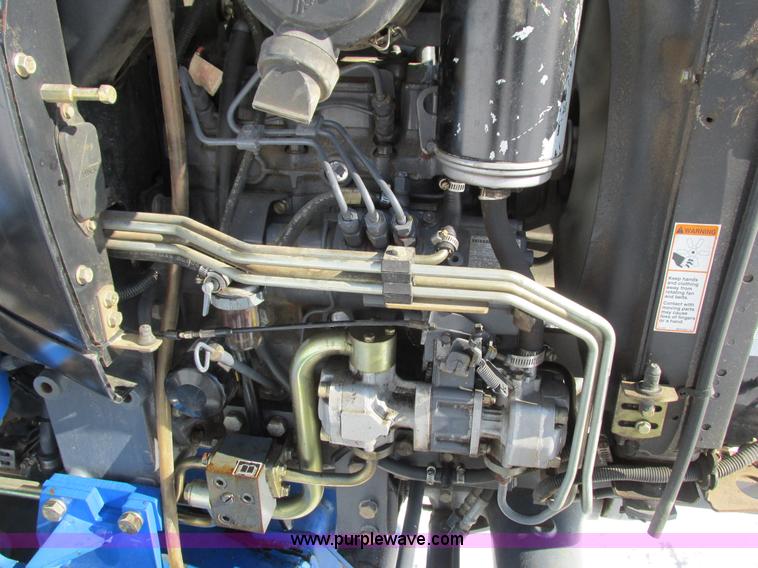 image for item G8879 2001 New Holland TC25D MFWD garden tractor