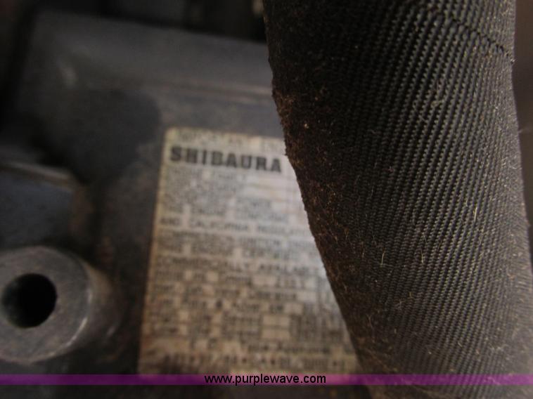 image for item G8879 2001 New Holland TC25D MFWD garden tractor