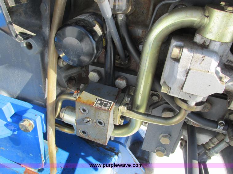 image for item G8879 2001 New Holland TC25D MFWD garden tractor