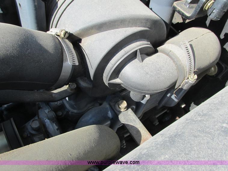 image for item G8879 2001 New Holland TC25D MFWD garden tractor