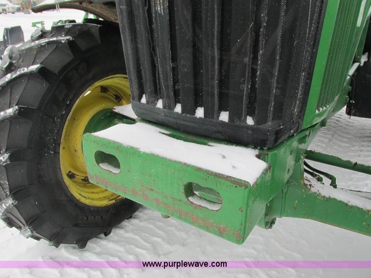 image for item G8887 1997 John Deere 7810 MFWD tractor