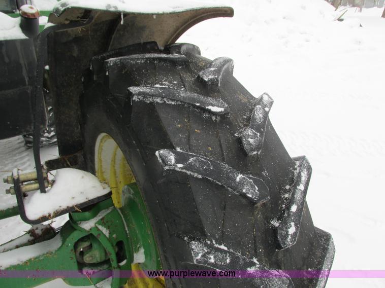 image for item G8887 1997 John Deere 7810 MFWD tractor