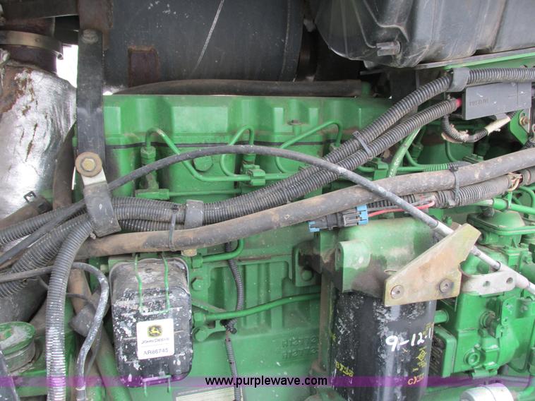 image for item G8887 1997 John Deere 7810 MFWD tractor