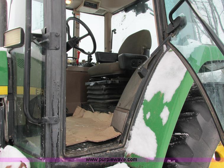 image for item G8887 1997 John Deere 7810 MFWD tractor