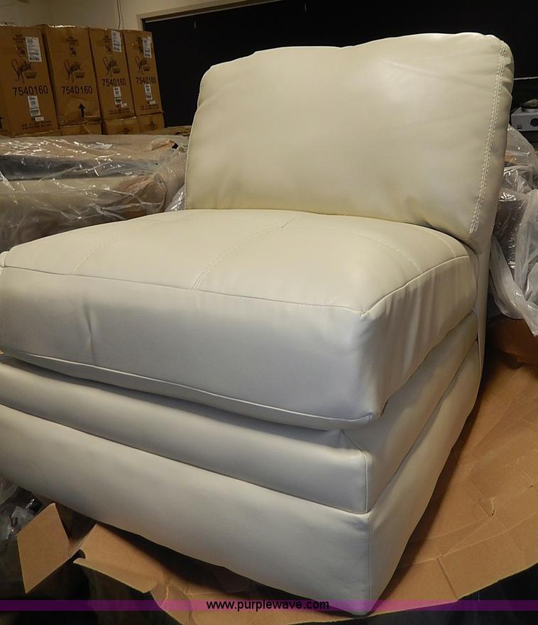 image for item AX9180 (13) Ashley Furniture faux leather chairs