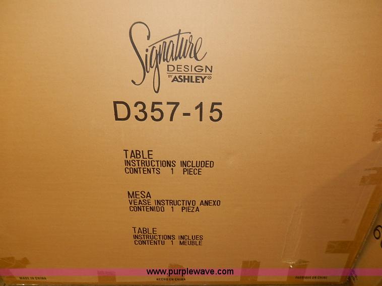 image for item AX9183 (8) Ashely Signature Design glass top tables