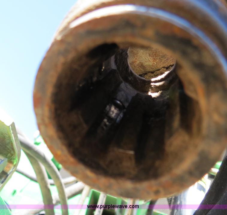 image for item B4872 2012 John Deere 568 round baler