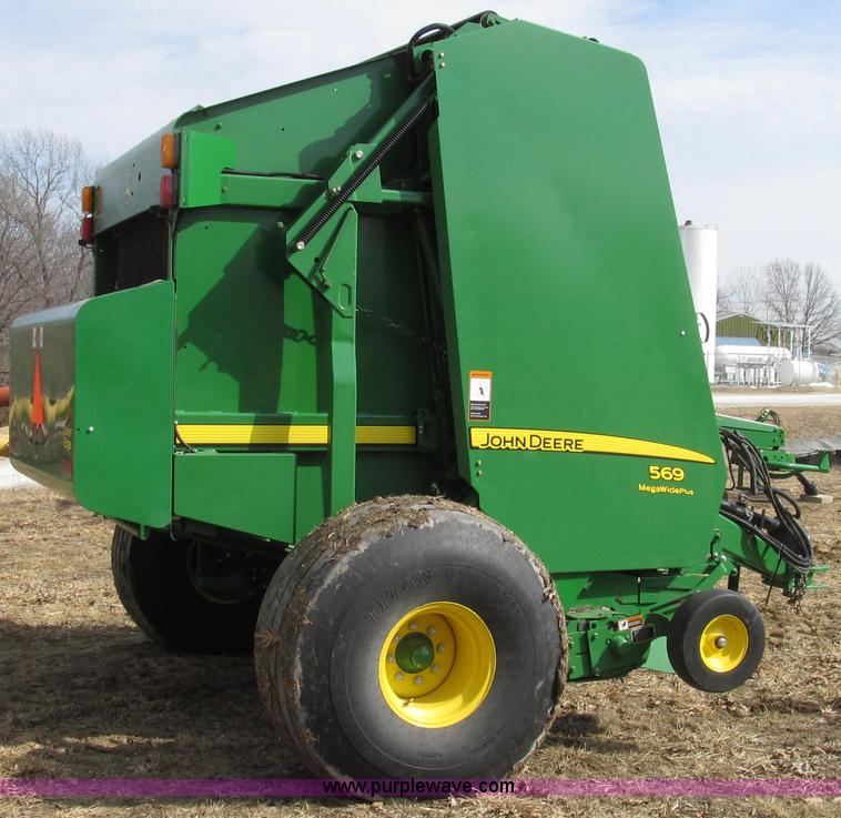 image for item G2296 2013 John Deere 569 round baler