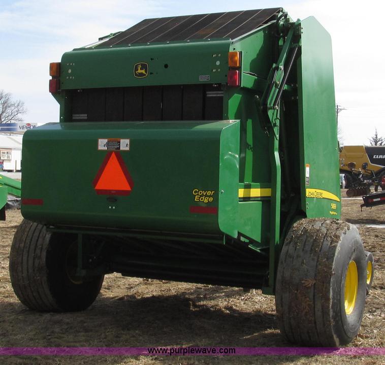 image for item G2296 2013 John Deere 569 round baler
