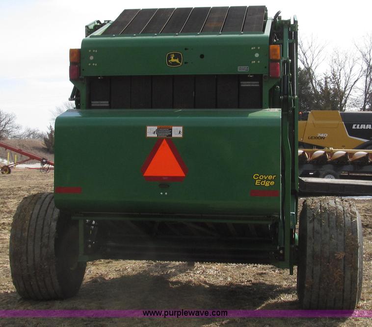 image for item G2296 2013 John Deere 569 round baler