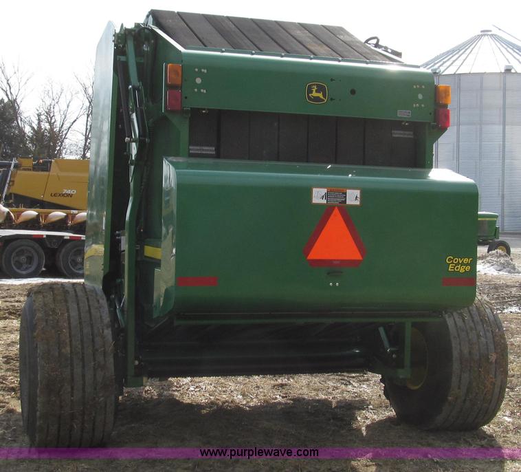 image for item G2296 2013 John Deere 569 round baler