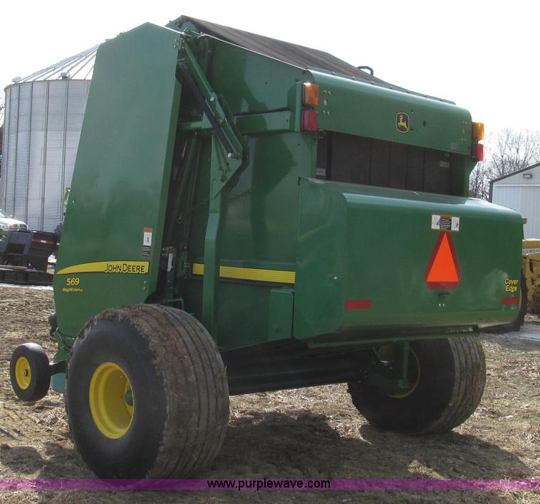 image for item G2296 2013 John Deere 569 round baler