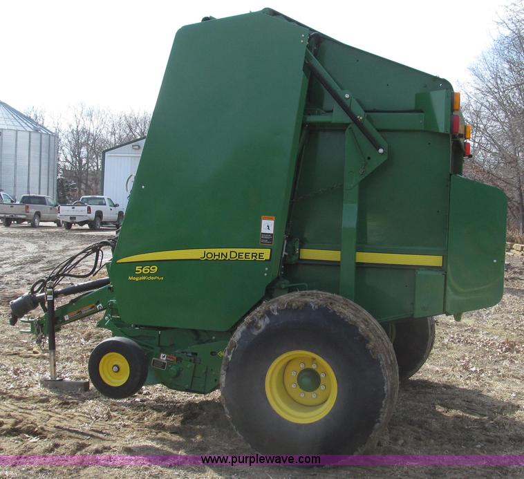 image for item G2296 2013 John Deere 569 round baler