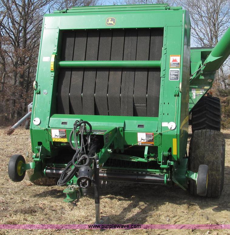 image for item G2296 2013 John Deere 569 round baler