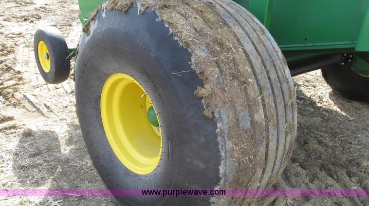 image for item G2296 2013 John Deere 569 round baler