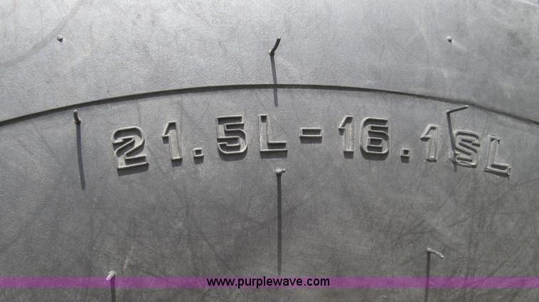 image for item G2296 2013 John Deere 569 round baler