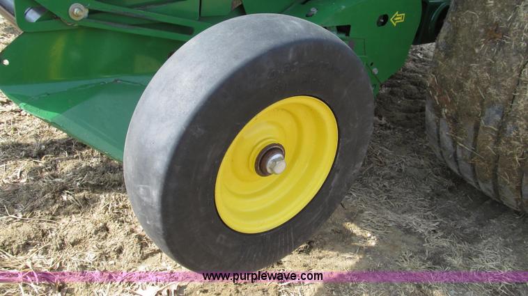 image for item G2296 2013 John Deere 569 round baler