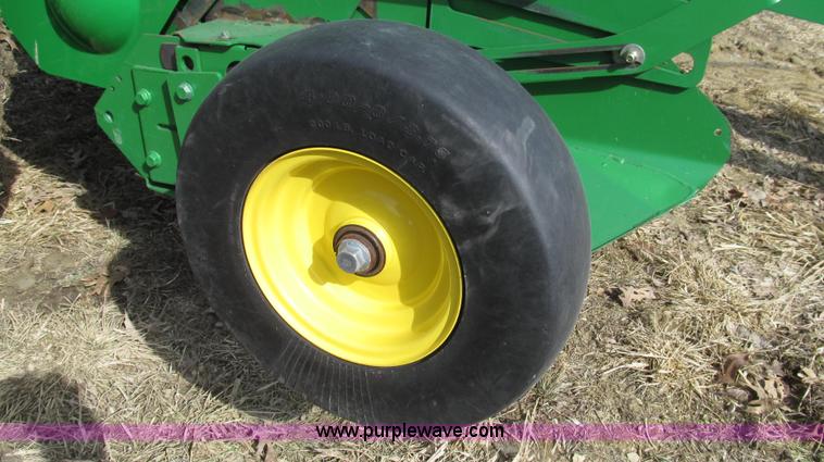 image for item G2296 2013 John Deere 569 round baler