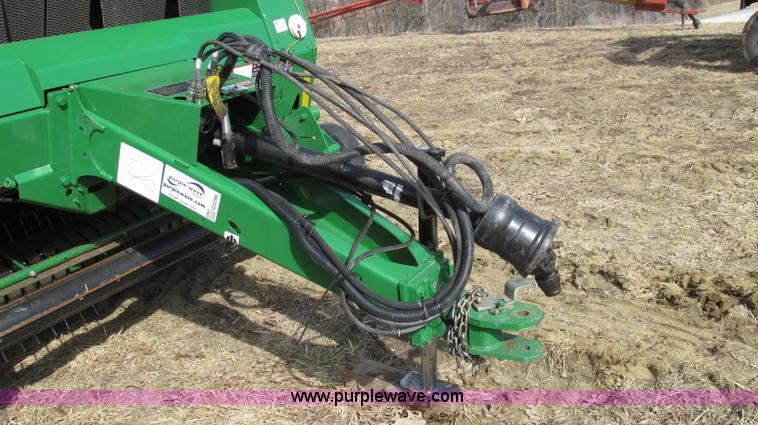 image for item G2296 2013 John Deere 569 round baler