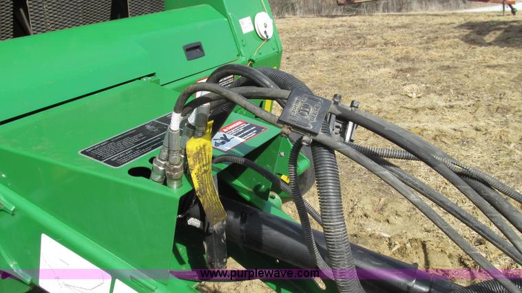 image for item G2296 2013 John Deere 569 round baler