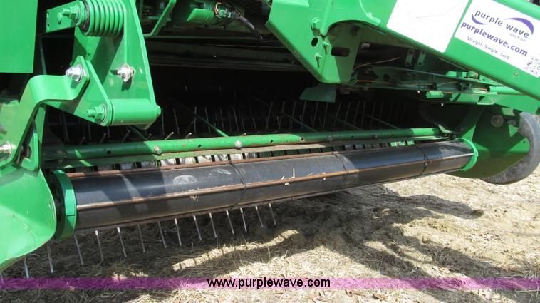 image for item G2296 2013 John Deere 569 round baler