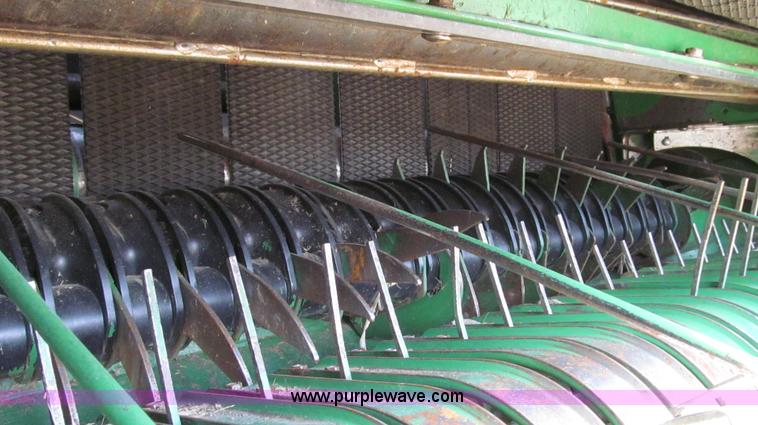 image for item G2296 2013 John Deere 569 round baler