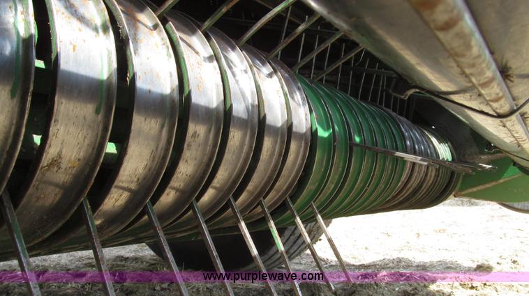 image for item G2296 2013 John Deere 569 round baler