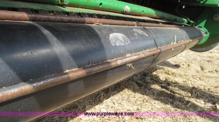 image for item G2296 2013 John Deere 569 round baler