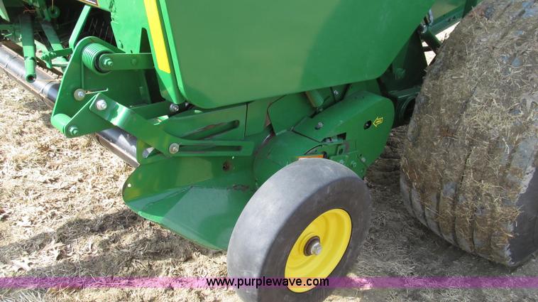 image for item G2296 2013 John Deere 569 round baler
