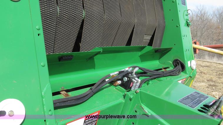 image for item G2296 2013 John Deere 569 round baler