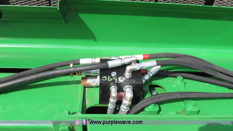 image for item G2296 2013 John Deere 569 round baler