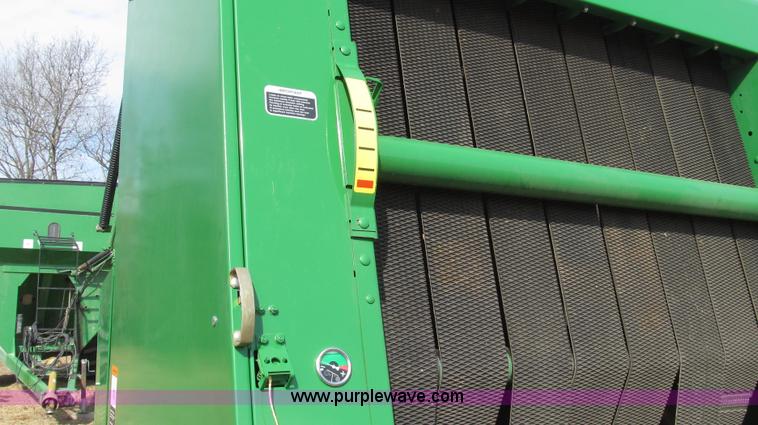 image for item G2296 2013 John Deere 569 round baler