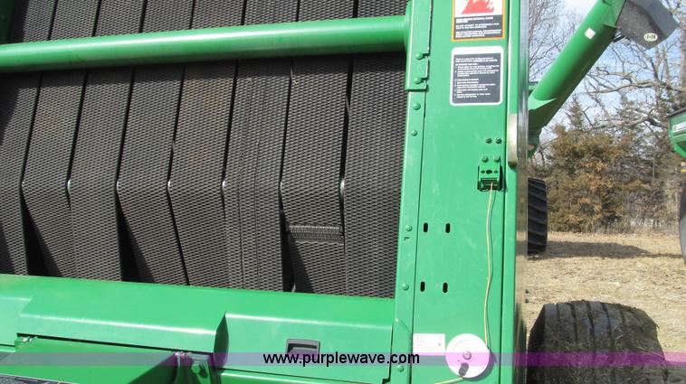 image for item G2296 2013 John Deere 569 round baler
