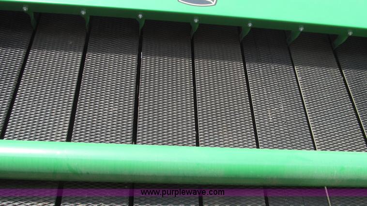 image for item G2296 2013 John Deere 569 round baler