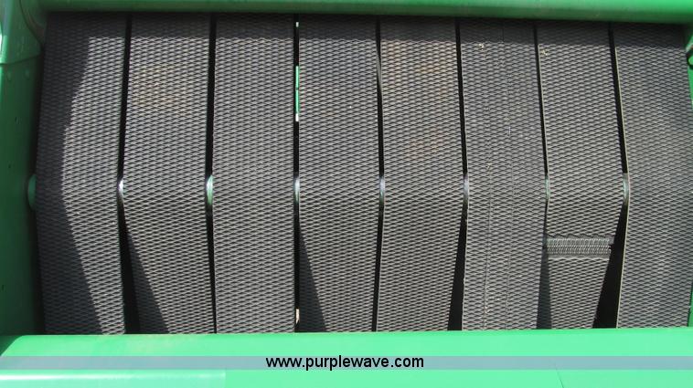 image for item G2296 2013 John Deere 569 round baler