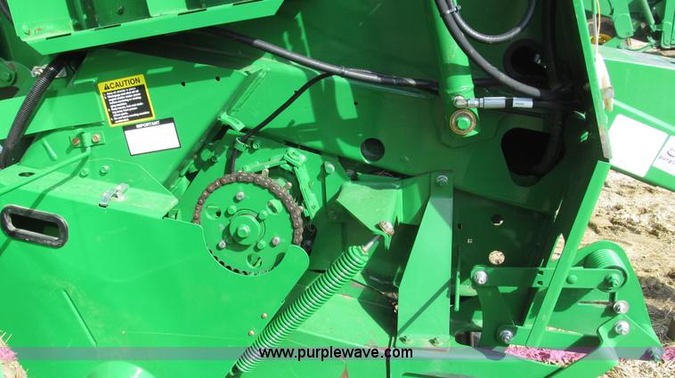 image for item G2296 2013 John Deere 569 round baler