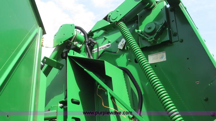 image for item G2296 2013 John Deere 569 round baler
