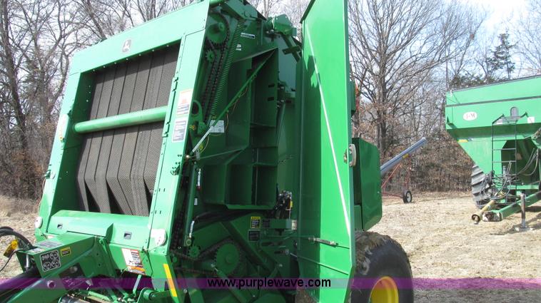 image for item G2296 2013 John Deere 569 round baler