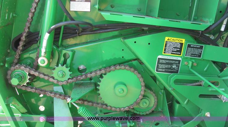 image for item G2296 2013 John Deere 569 round baler