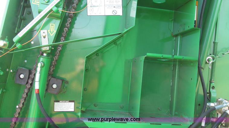image for item G2296 2013 John Deere 569 round baler