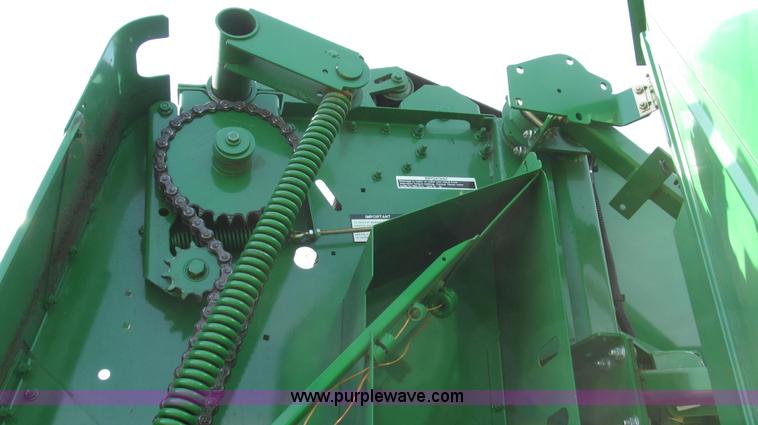 image for item G2296 2013 John Deere 569 round baler