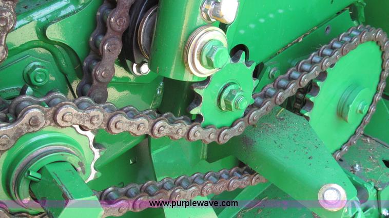 image for item G2296 2013 John Deere 569 round baler